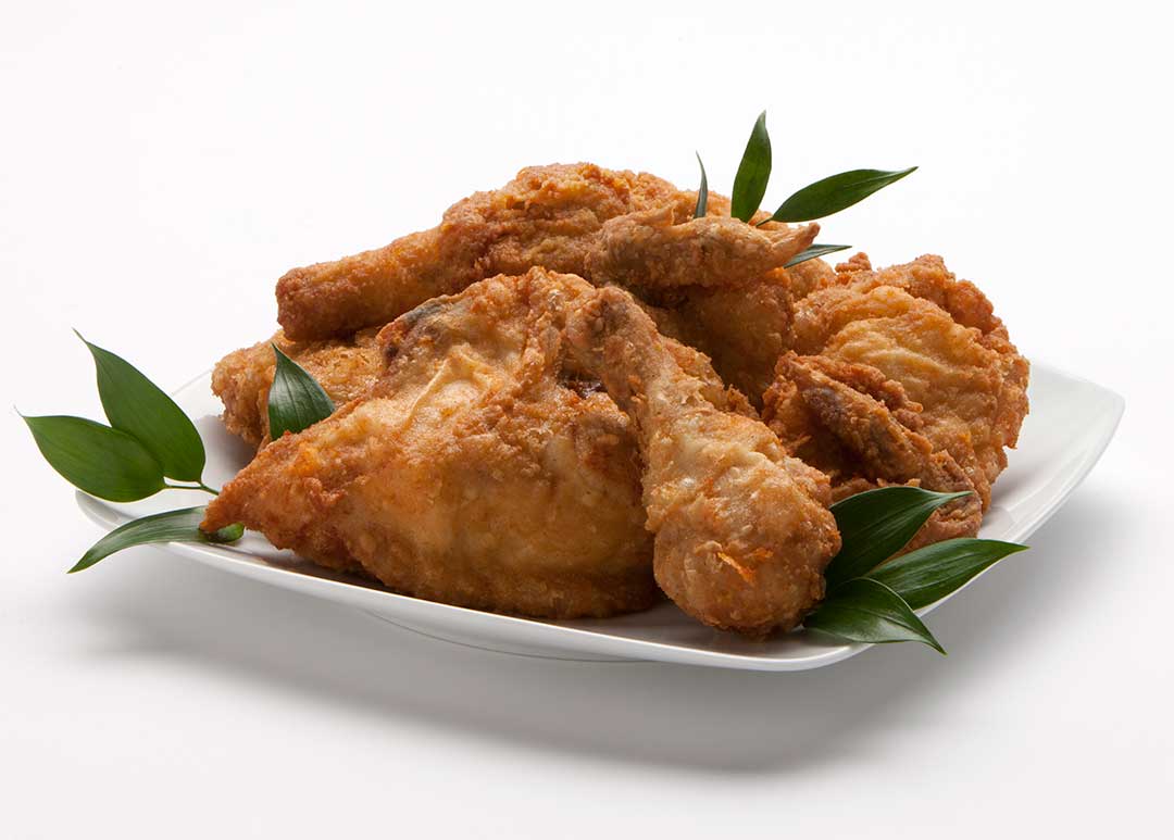 Signature fried chicken displayed in the deli section at Super One Foods.